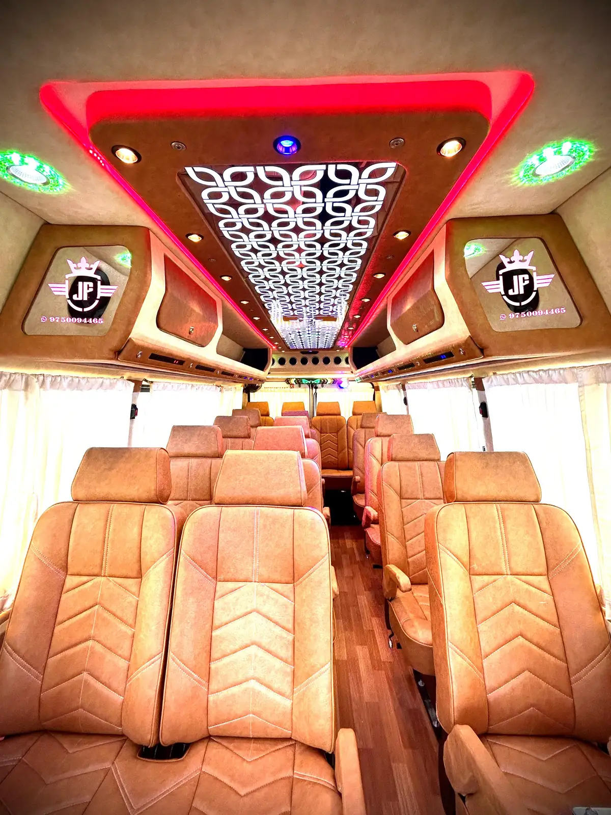 Luxury Force Traveller interior with tan leather seating, red ceiling accent and ambient DJ lighting